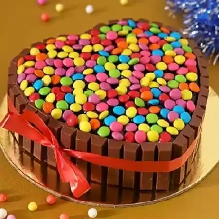 Online yummy round chocolate gems cake to Pune, Express Delivery -  PuneOnlineFlorists