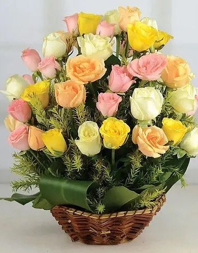 Artful Mixed Roses Arrangement in Round Basket