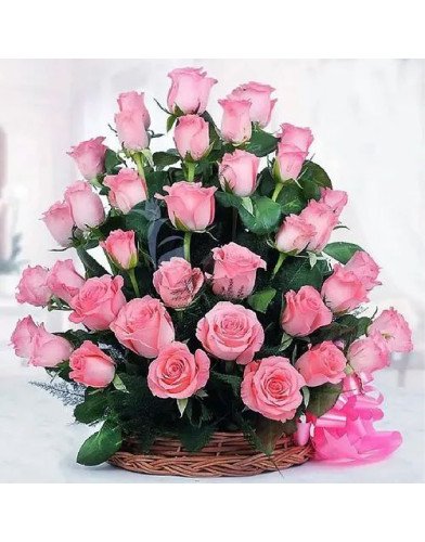 Bright Baskets of Long Stemmed Pink Roses with a Bow
