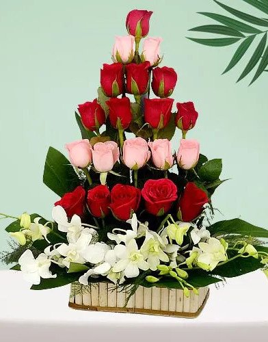 Cheerful Tall Basket Arrangement of Roses N Orchids