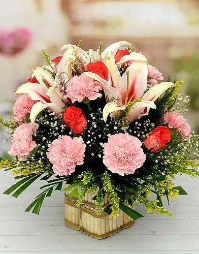 Elegant Full of Carnations Lily N Roses Basket
