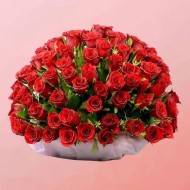 Mesmerizing Display of Red Roses with Greens in Basket