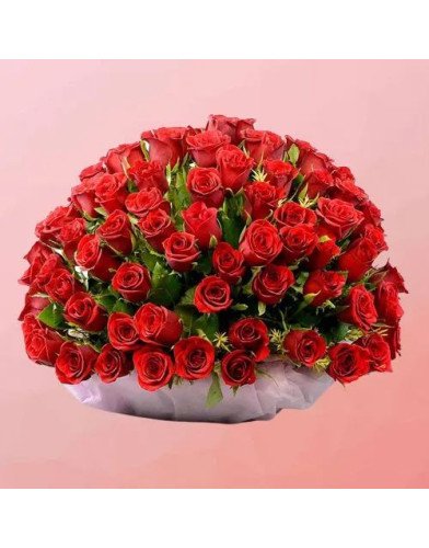 Mesmerizing Display of Red Roses with Greens in Basket