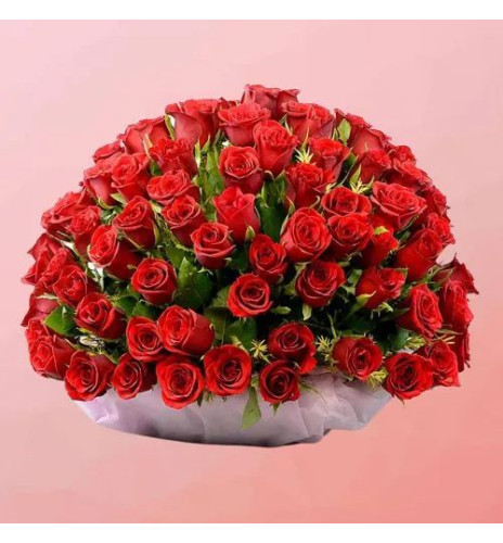Mesmerizing Display of Red Roses with Greens in Basket