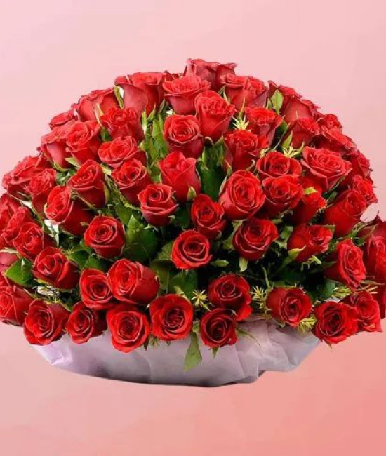 Mesmerizing Display of Red Roses with Greens in Basket Mesmerizing Display of Red Roses with Greens in Basket