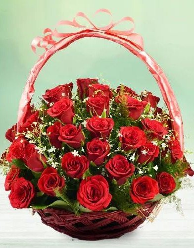 Ravishing Basket of 50 Red Roses