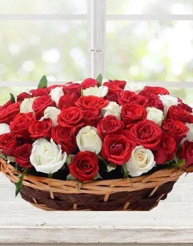 Unique Array of Red N White Roses in Oval Basket