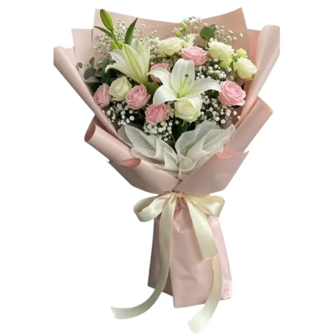 fresh white lilies and pastel pink roses bouquet wrapped in blush paper with cream ribbon hyderabad delivery