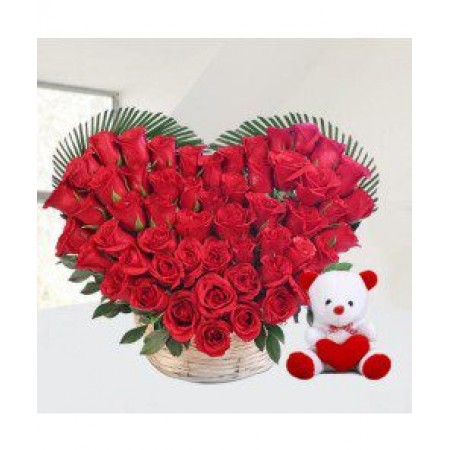 Red roses heart with teddy