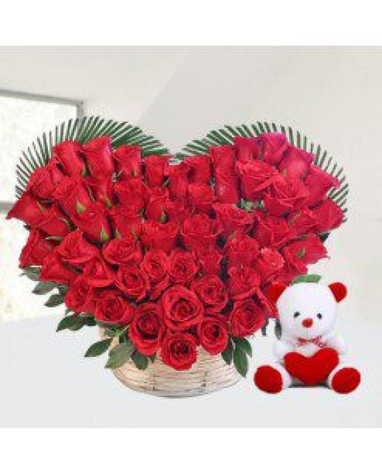 Red roses heart with teddy