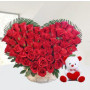 Red roses heart with teddy