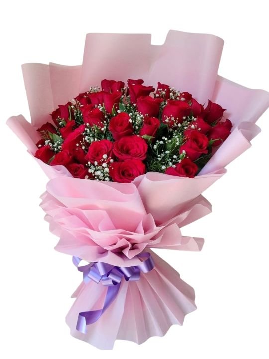 Red roses hand bouquet delivery in Hyderabad